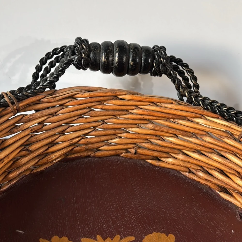 Vintage Decorative Woven Basket with metal and wood Handles. Hand painted